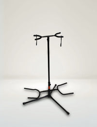 A black double guitar stand with smart locking system, capable of holding two guitars side by side.